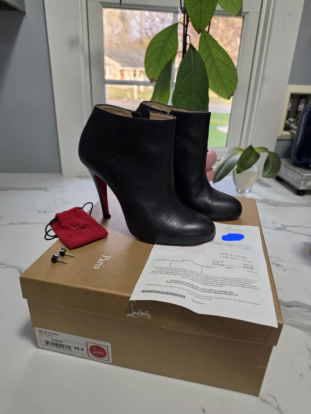 Christian Louboutin Black Leather High-Heel Ankle Boots with Red Sole